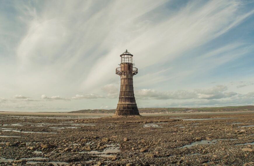 Old abandoned lighthouse rocky coast