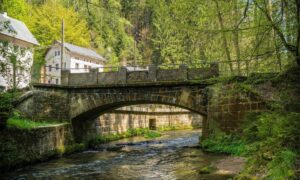 Green stone bridge river