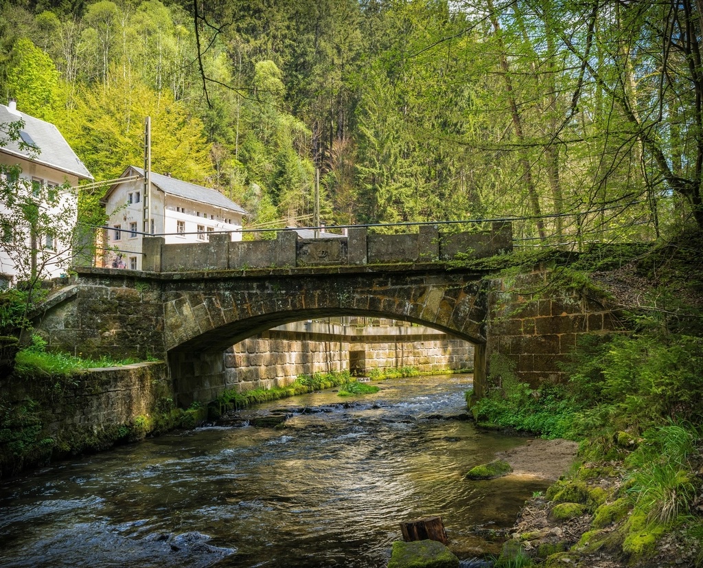 Green stone bridge river