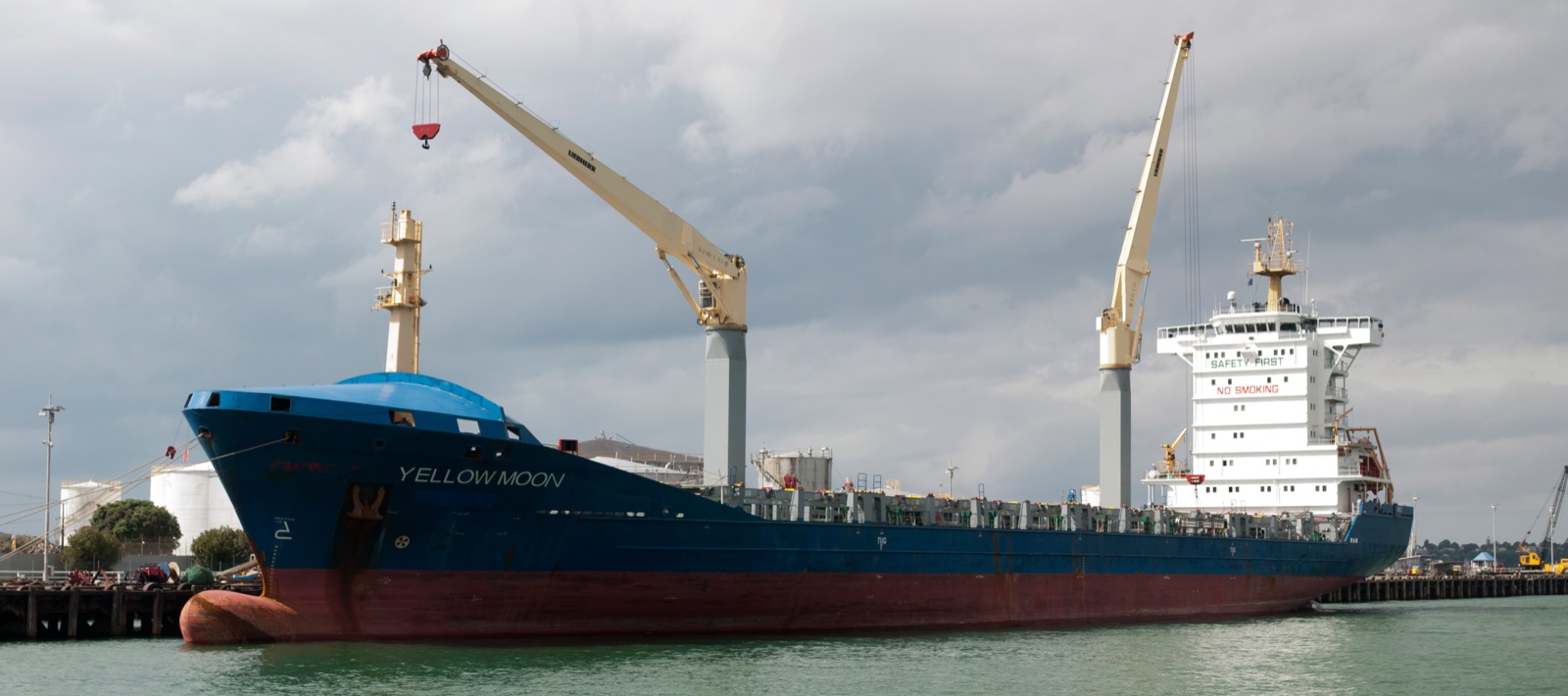 Yellow Moon container ship docked in Auckland harbour